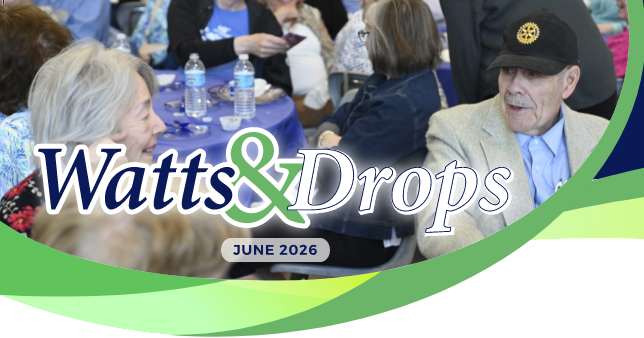 Photo of the Watts & Drops Newsletter, showing two senior citizens eating lunch together