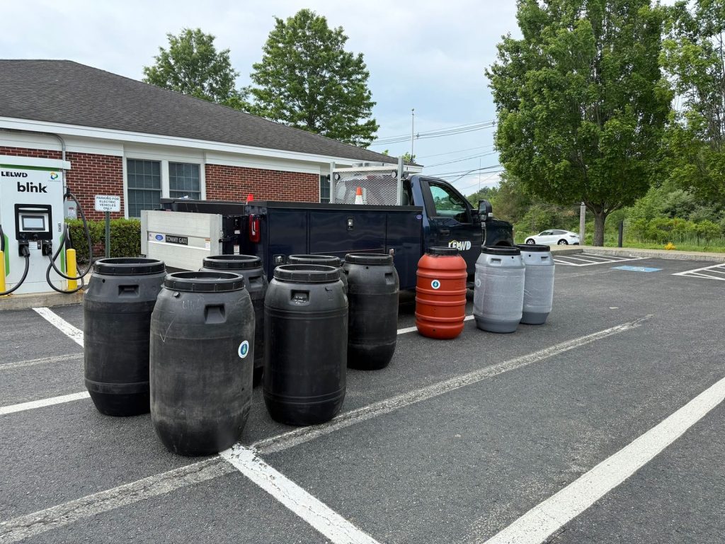 Rain barrels in a parking lot